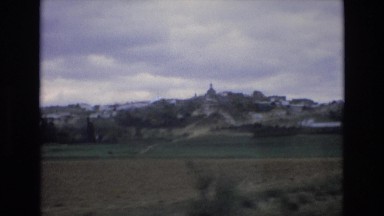 1969: a small township on the top of a hill under the overcast sky SPAIN