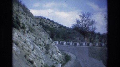 1969: pulling up to more of an endless road on a summer day SPAIN
