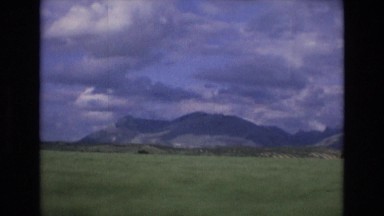 1969: distant mountains alongside road clouds SPAIN
