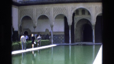 1969: people visiting site walking near water pool amazing architecture pillars