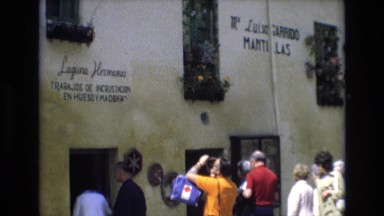1969: People Taking Picture of Historic Building in Spain