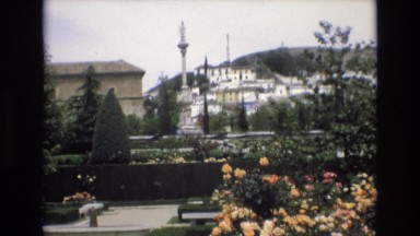1969: vintage shaky clip of a park and monument in background