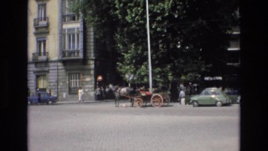 1969: horse carriage riding street alongside SPAIN