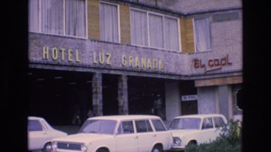 1969: exterior of the hotel luz granada, spain, with cars and people