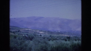 1969: beautiful view greenery around clear blue sky hills electricity wires