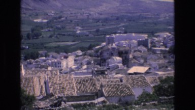 1969: airplane viewing of a small, rural town. SPAIN