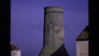 1969: the huge vent of a factory standing erect under the blue sky SPAIN