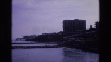 1969: a tall building with windows lining the entire outside SPAIN