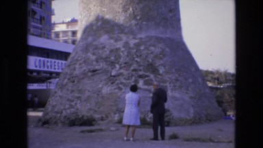 1969: Tourists Viewing an Abstract Stone Monument in Spain