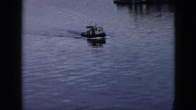 1956: Small Boat Sailing Near Cuban Harbor