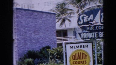 1956: normal viewing of a hotel with people walking inside. CUBA