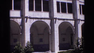 1972: large garden fountain, in a courtyard, surrounded by classic arches