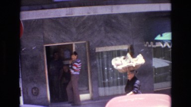 1972: women balancing basket on head PORTUGAL