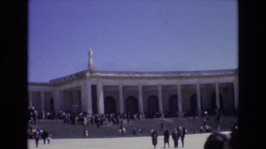 1972: People Visiting Gathered Near Old Building Monument