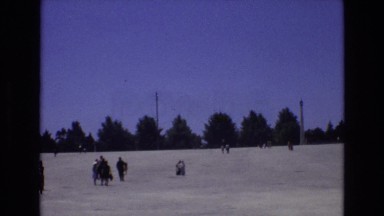 1972: groups of people walking in the field toward unspecified point PORTUGAL