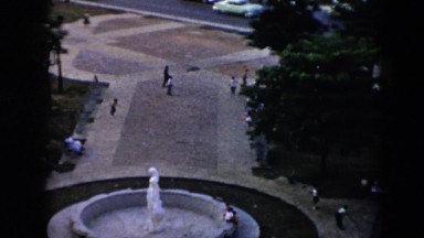 1956: sighting from a window, watching the busy city life. CUBA