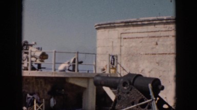 1956: people standing on top of a platform viewing what is around them CUBA