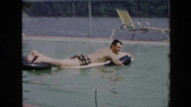 1956: a man and woman swimming in a pool CUBA