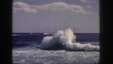 1961: White Cap Waves Crashing Into Each Other and Rolling onto the Shore Hawaii