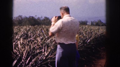 1961: stopping to take some photographs with his son. HAWAII