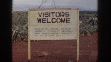 1961: greenfield board allowing visitors kept people standing road alongside
