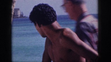 1961: viewing of a man by the beach. HAWAII