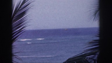1961: a sailboat sails the ocean HAWAII