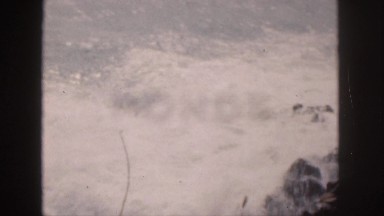 1961: waves breaking on the rocks in hawaii HAWAII