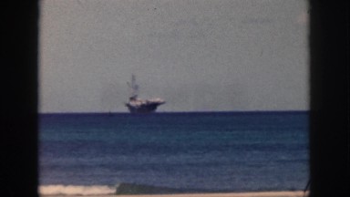 1961: ship off in the distance on the ocean. HAWAII