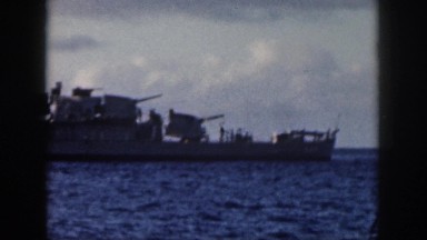 1961: old warship viewed from another ship HAWAII