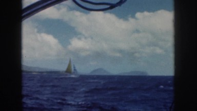 1961: blue skies, clouds, fishing, sailboat, island, ocean HAWAII
