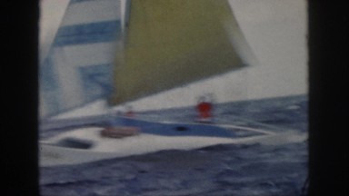 1961: a sailboat traveling out on the ocean. HAWAII