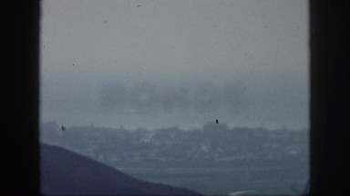 1961: historic video clip of cityscape in distance HAWAII