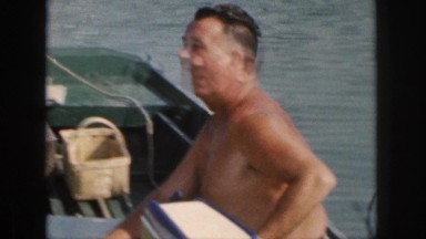 1961: man taking a trip in his boat to do some fishing. MICHIGAN