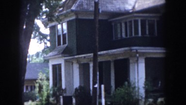 1958: view of home place built in 1880s with gables and porches