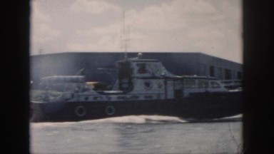 1958: huge ships sailing vast sea arriving to ports beautiful view clouds in sky