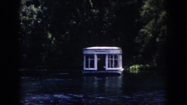 1958: viewing of a lake with a houseboat on it. NEW ORLEANS LOUISIANA