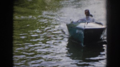 1958: man sailing boat river catching something steering VIRGINIA