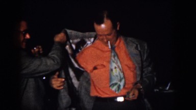 1958: men wearing suits standing, drinking and having joyful moments VIRGINIA