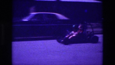 1981: car moving alongside small go kart SAN DIEGO