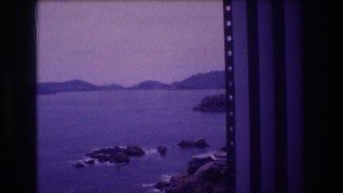 1982: Panoramic Vista of Ocean Shore and City in Acapulco Mexico