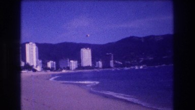 1982: Sea Side Apartments Sand Beautiful Sight Blue Water Trees on Corner