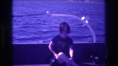 1982: woman feeling sea sick on a boat ACAPULCO MEXICO