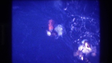 1982: sea swimmers with oxygen mask getting onto the boat platform ACAPULCO