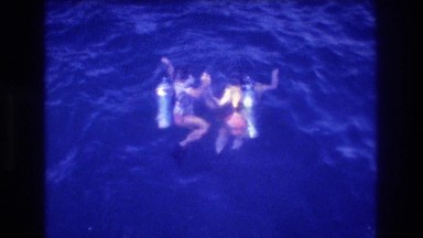 1982: scuba divers exploring the ocean. ACAPULCO MEXICO