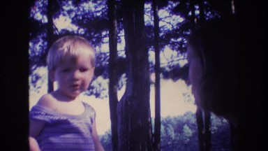 1975: a baby is trying to talk to his mom and tell her something BAXTER MAINE
