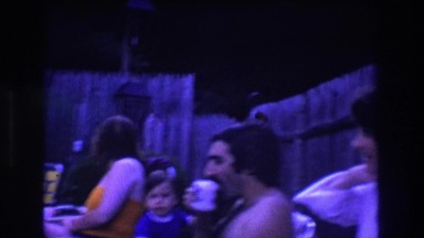 1975: people enjoying quality time by the pool. BOSTON