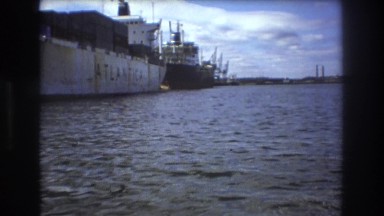 1975: enjoying a beautiful afternoon checking one huge vessel . BOSTON