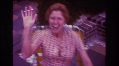 1975: A Lady of a Certain Age Smoking a Cigarette and Hamming for the Camera