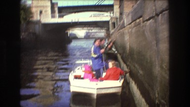 1975: people on boat BOSTON